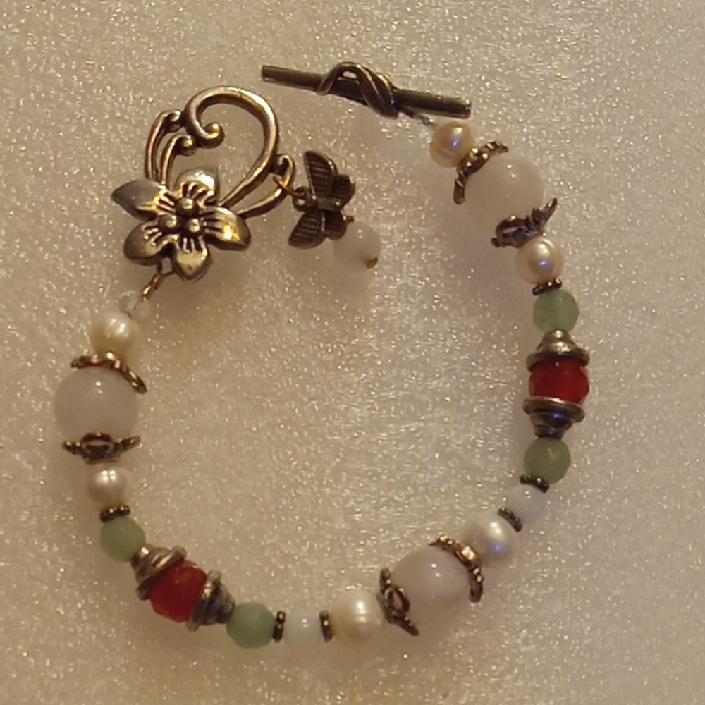 Elegant Floral Charm Bracelet with Red and Green Accents